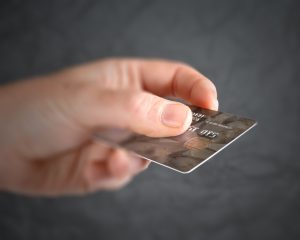 a hand holds a credit card- but Do Citi ThankYou Points Expire?