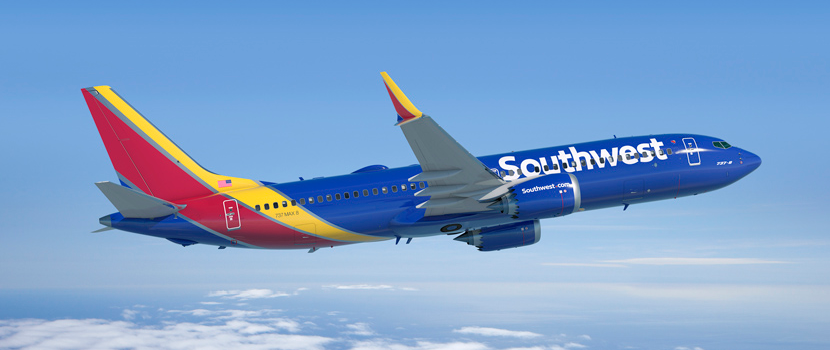 a Southwest plane in flight; the airline's loyalty program is Rapid Rewards