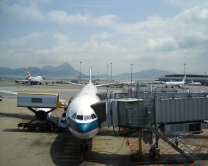 Photo of Cathay Pacific plane connected to a jetbridge