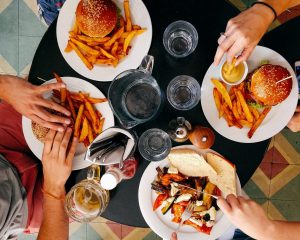 overhead view of many plates on a table at a restaurant