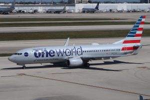 an American Airlines plane with Oneworld branding on the side
