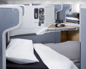 American Airlines Boeing 777-300ER business class seat reclined into a lay-flat bed