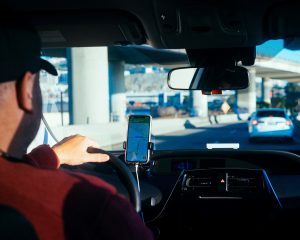 looking through the front window of a car driving for Lyft