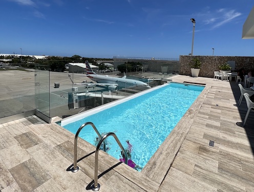The Perks of Airport Lounges: outdoor swimming pool at VIP Lounge Punta Cana