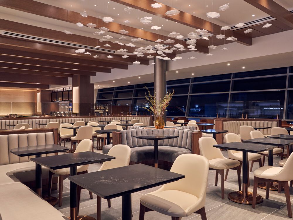 American Airlines British Airways The SoHo Lounge features table-side dining with mobile ordering throughout the lounge
