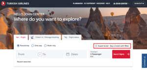 Screenshot of Turkish Airlines homepage with the "Award ticket - buy a ticket with miles" option highlighted