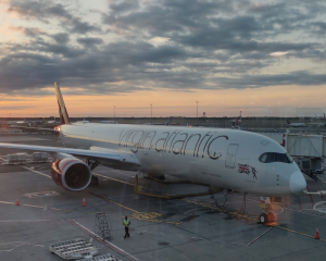 a Virgin Atlantic A350 parked at a gate
