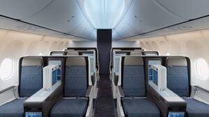 the interior of a plane's business-class cabin before passengers board