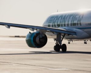 a Frontier plane taxis to the runway