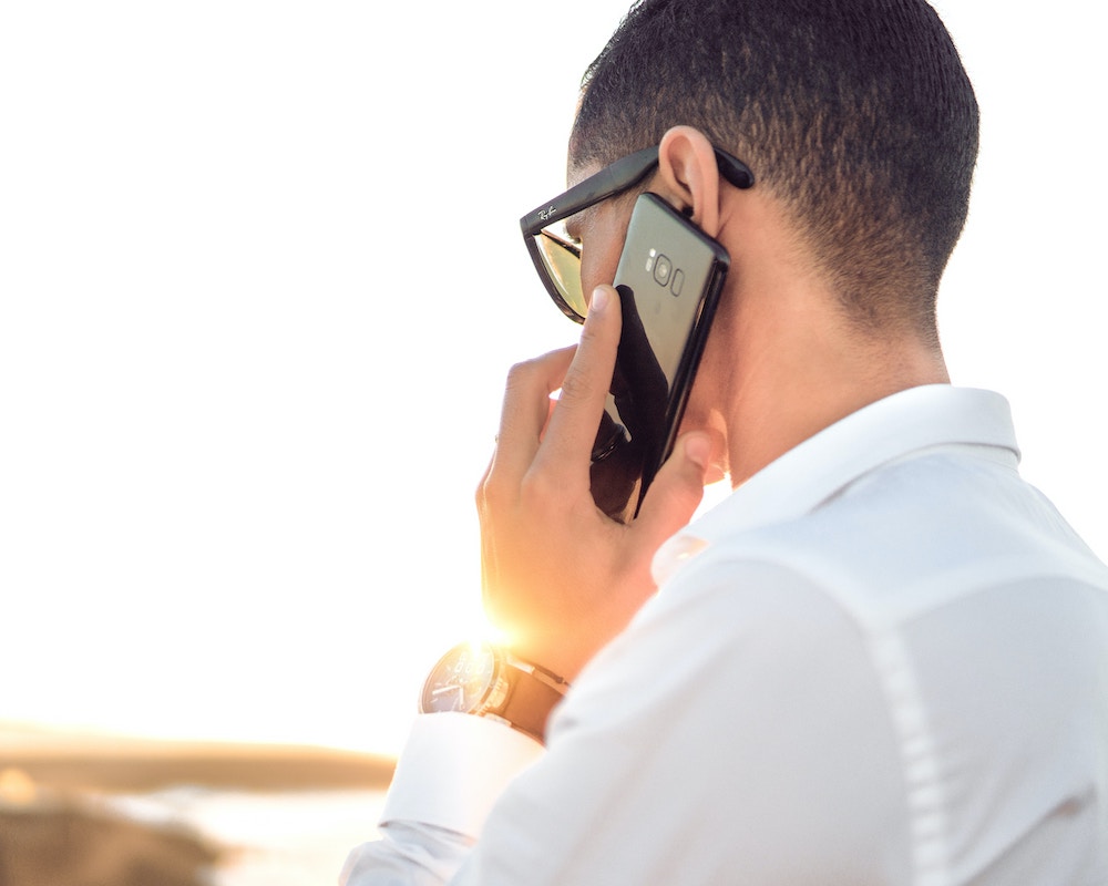 a man talks on a phone
