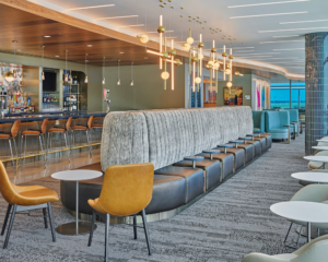 the seating area inside the Delta Sky Club at Kansas City (MCI) airport