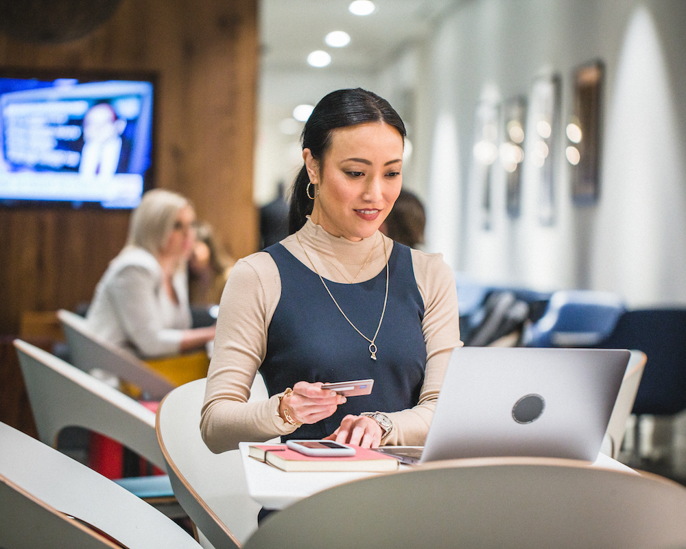 a person using a laptop for online shopping