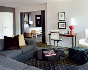 looking from the living room toward the bedroom at The Fifty Sonesta Select New York City hotel room