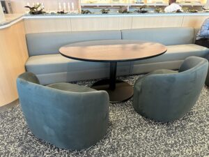 Image of big table in Capital One Lounge IAD