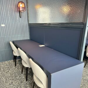 image of work tables in Capital One Lounge IAD