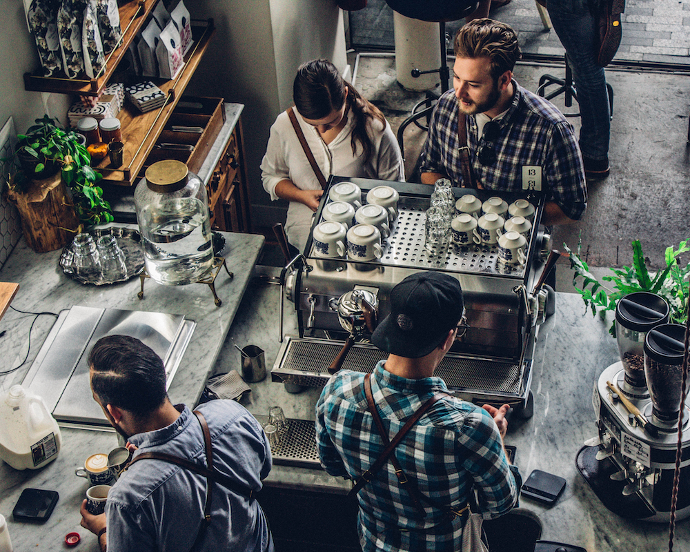 an overhead view of a busy coffee shop