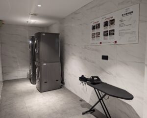 Self-service laundry room at UrCove by Hyatt Weifang