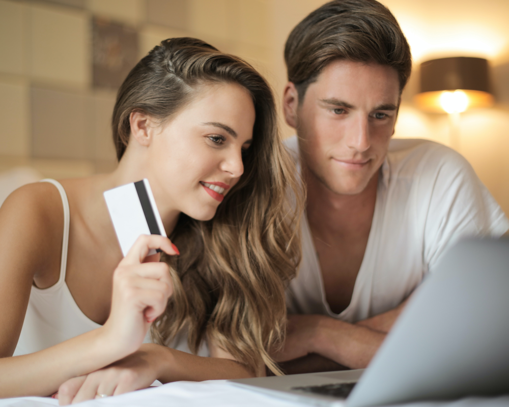 A couple using a laptop together
