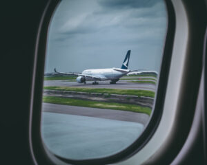 View of Cathay Pacific aircraft from the window of another plane