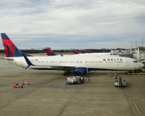 Line of Delta aircraft at the gates