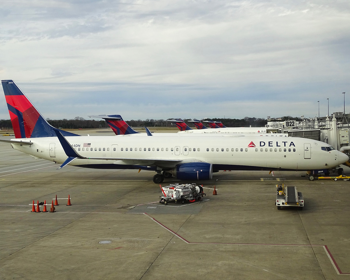 Line of Delta aircraft at the gates