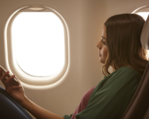 Iberia customer relaxing in her seat