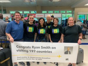 JT and Katie Genter meet Ryan Smith, his wife and parents in the Saint Vincent airport arrivals lounge