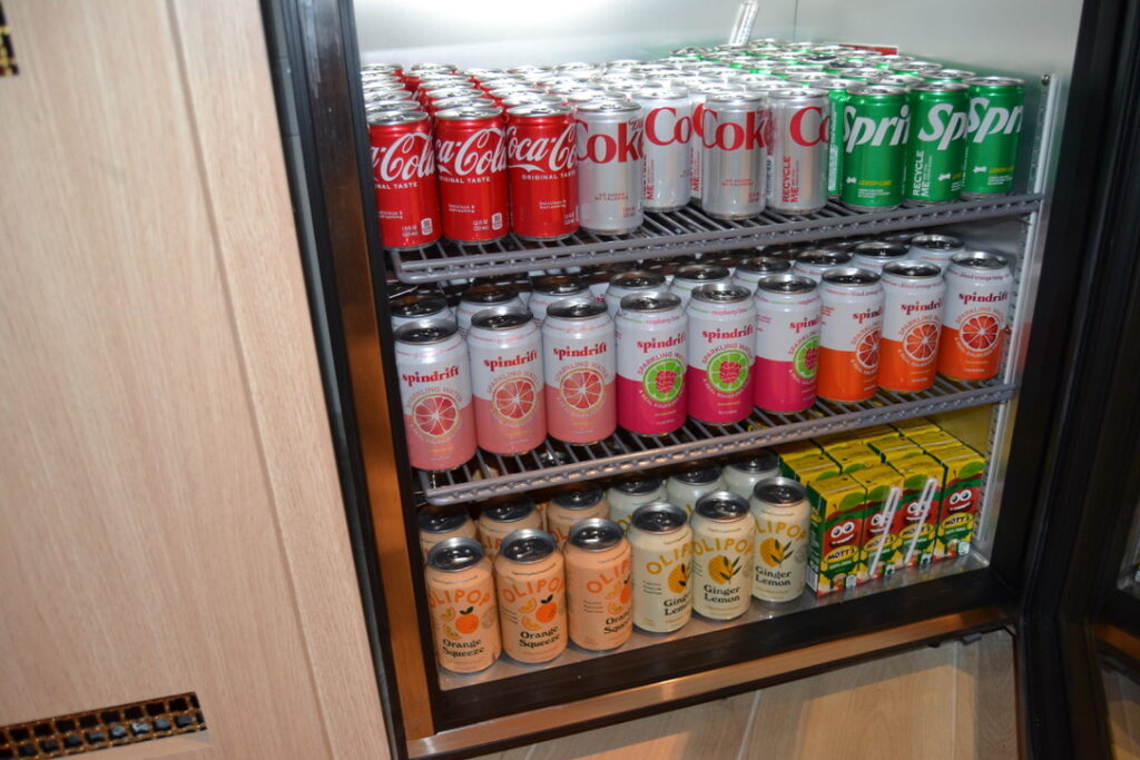 canned drinks in a fridge