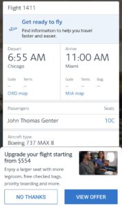 Screenshot of the American Airlines app showing an upgrade offer on a flight from Chicago to Miami