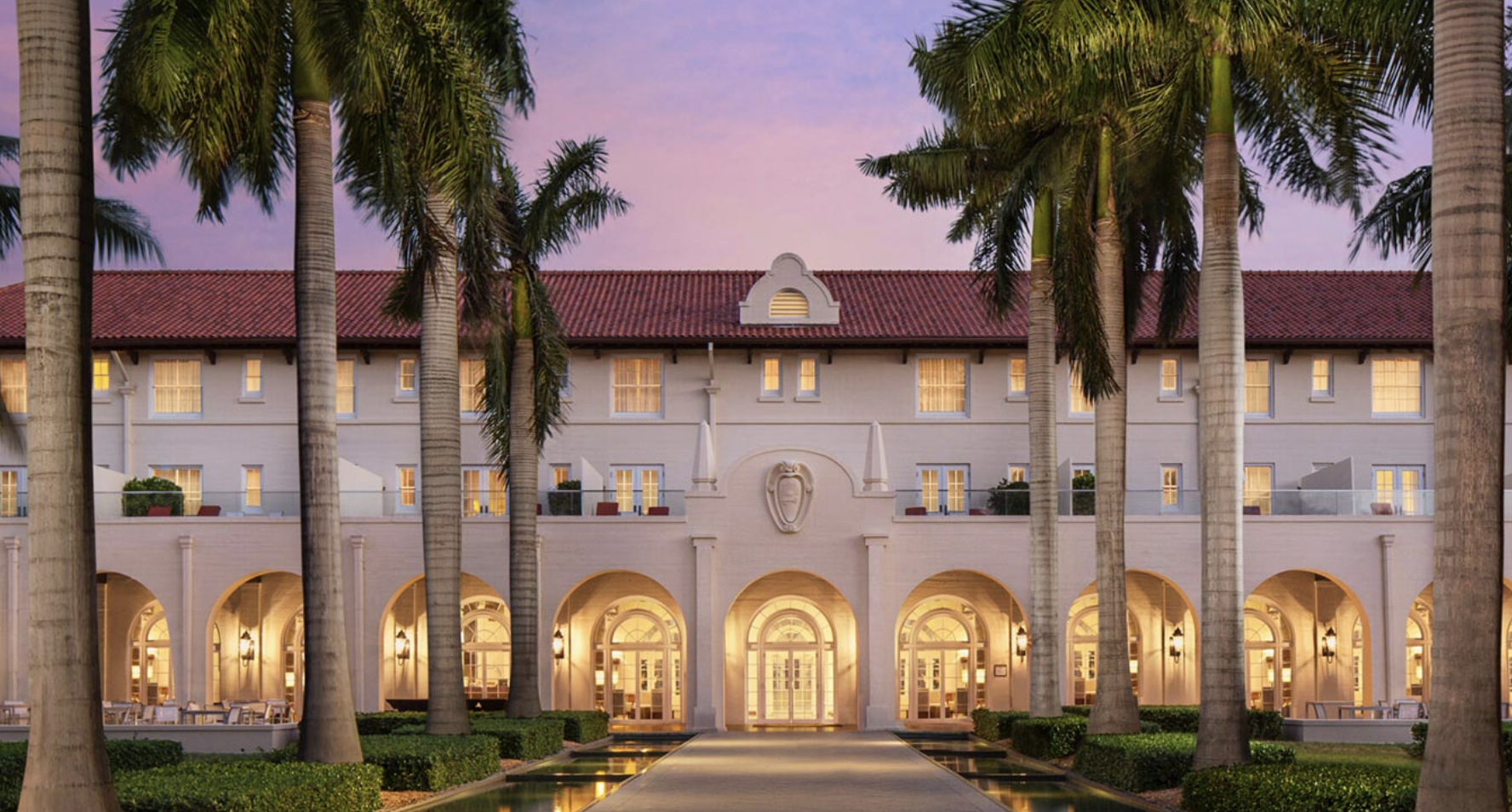 Exterior of the Casa Marina Key West, Curio Collection by Hilton at dusk.