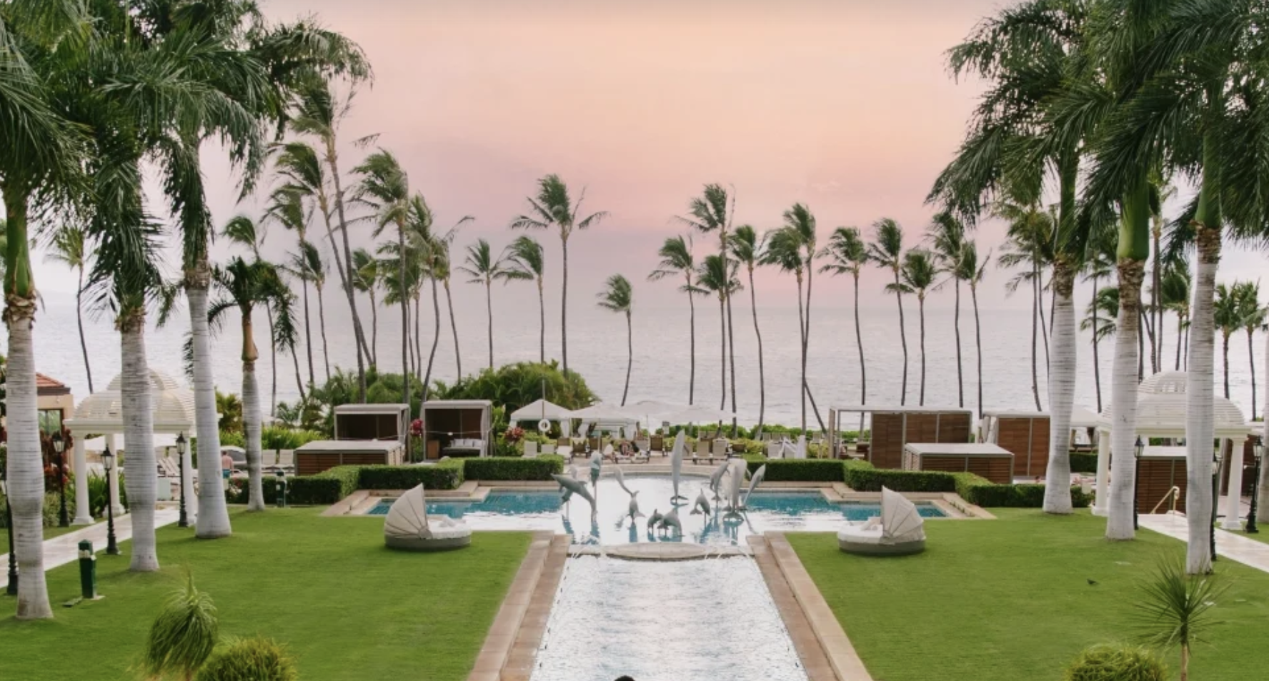 Evening sunset over the water at one of the most popular Hilton luxury hotels, the Ho'olei Villas at Grand Wailea, A Waldorf Astoria Resort