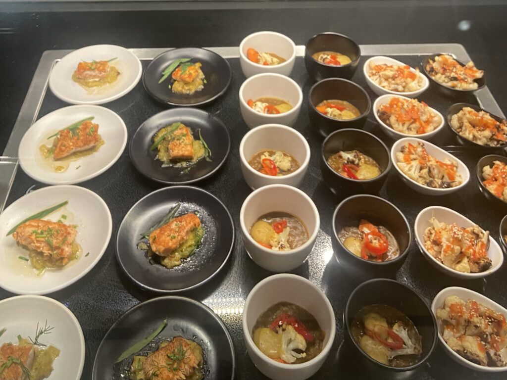 overhead view of small plates of food in the dining area