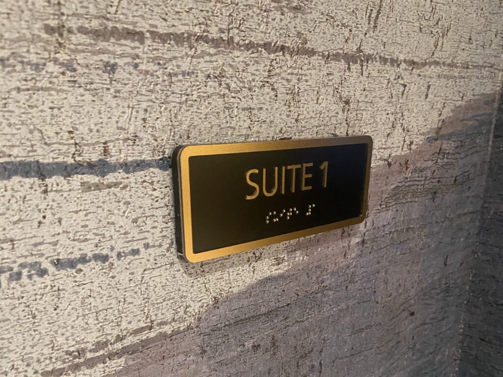sign for a suite inside the lounge