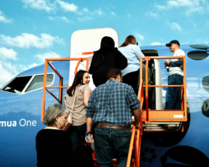Passengers boarding a Southwest aircraft via stairs
