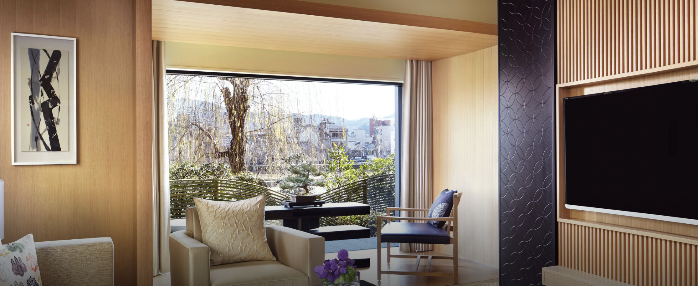 A view of the garden at the Ritz-Carlton Kyoto through a suite window