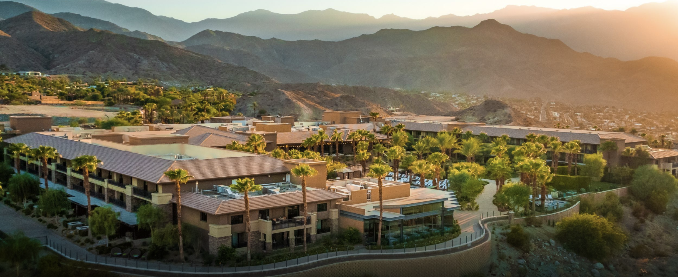 An aerial shot of the The Ritz-Carlton, Rancho Mirage at sundown.