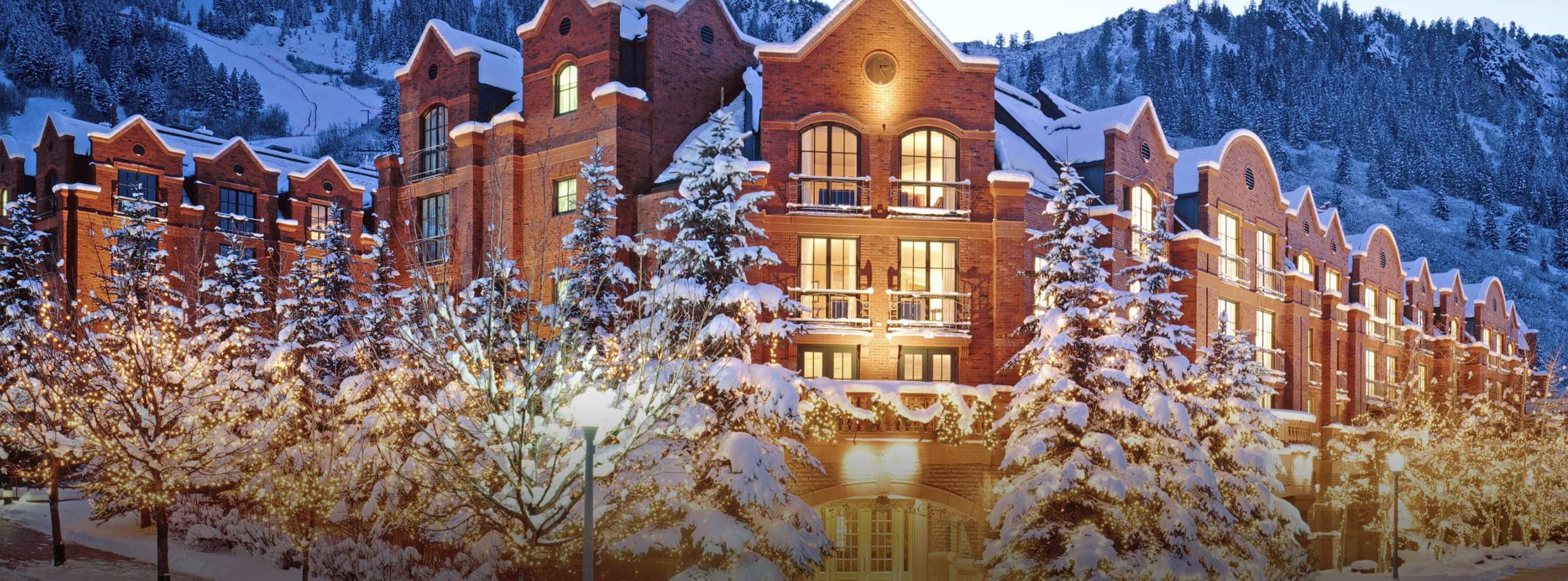 Snow-covered exterior of the The St. Regis Aspen Resort