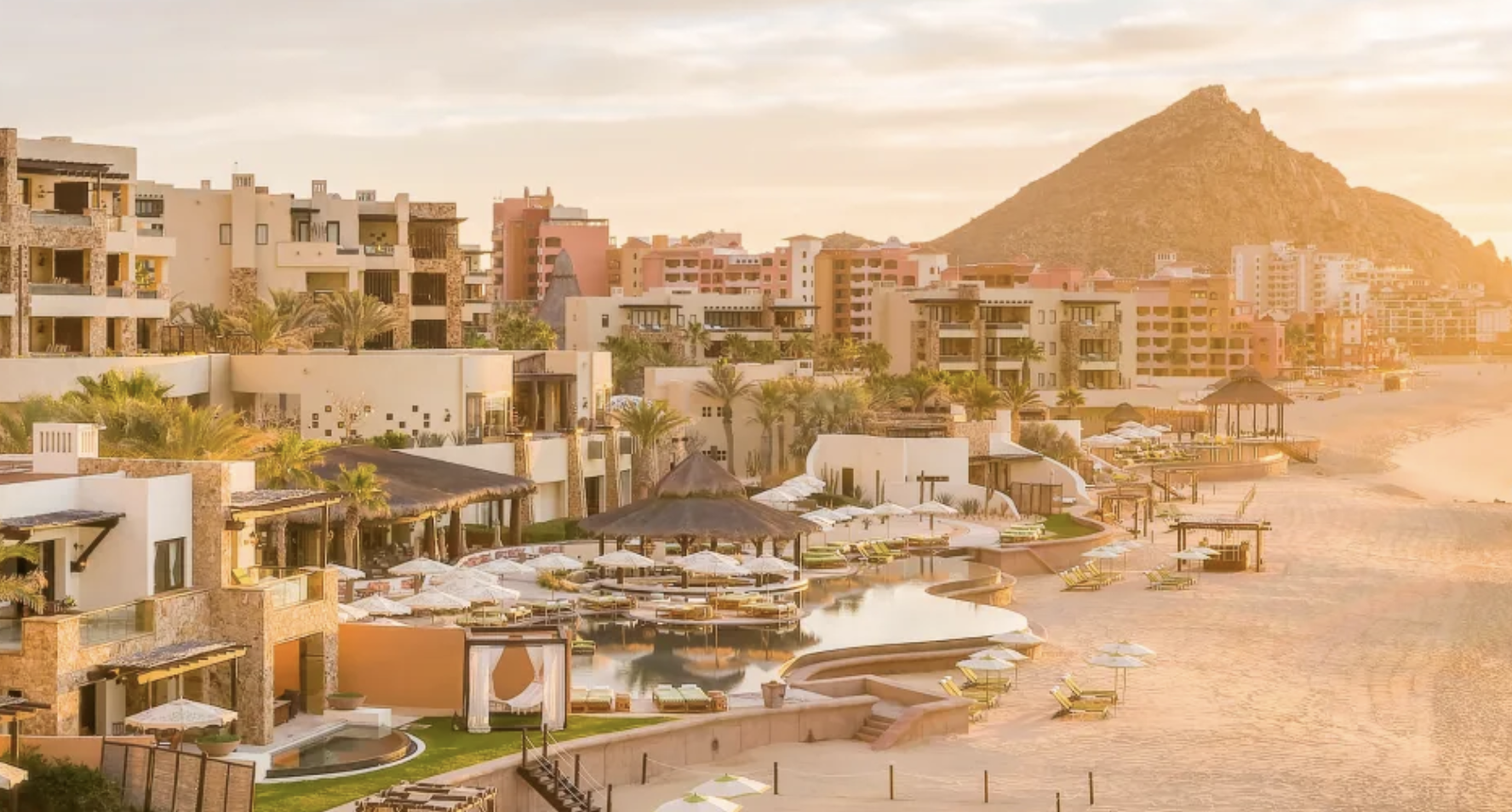 Exterior of the Waldorf Astoria Los Cabos Pedregal at sunset.