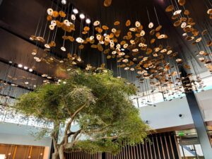 Photo of the olive tree and ceiling in the ATL Centurion Lounge