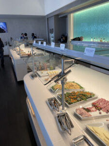 A buffet at an American Airlines Flagship Lounge