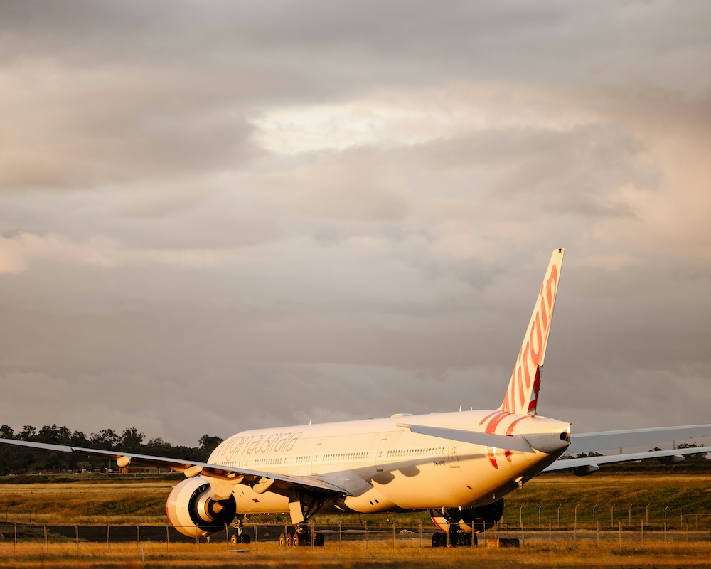 Virgin Australia plane taxiing to a runway.