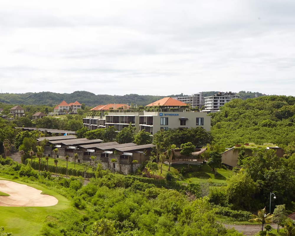 a luxury resort set amongst trees in Bali