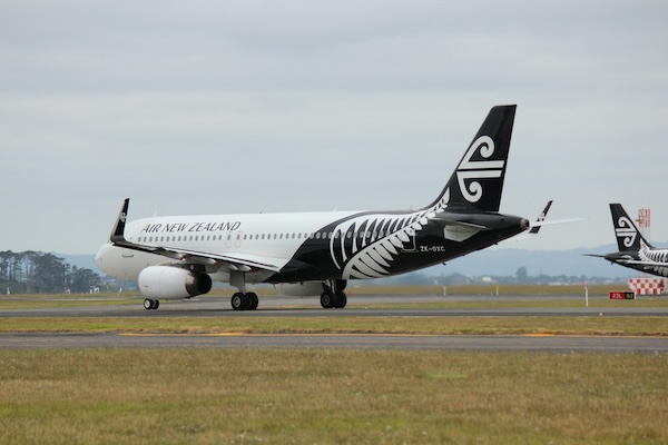 Air New Zealand A320 taxiing under gray skies.