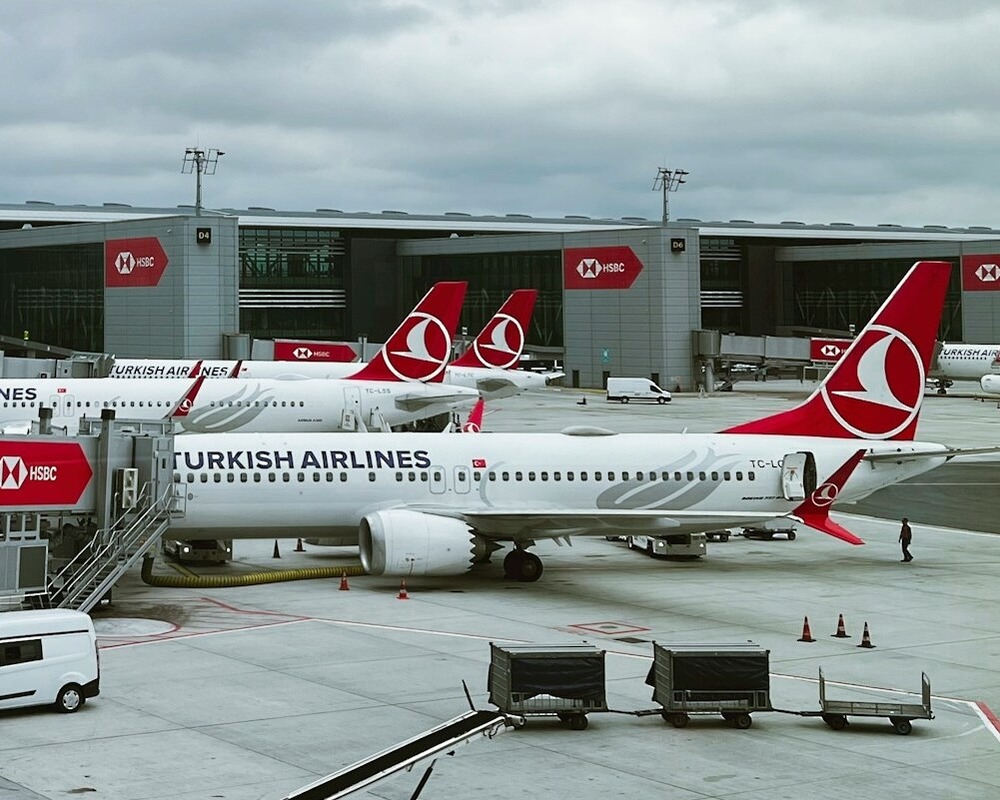 Turkish Airlines 737s parked at gates in IST.