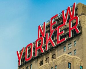 Red-lettered sign on the exterior of the New Yorker by Wyndham.