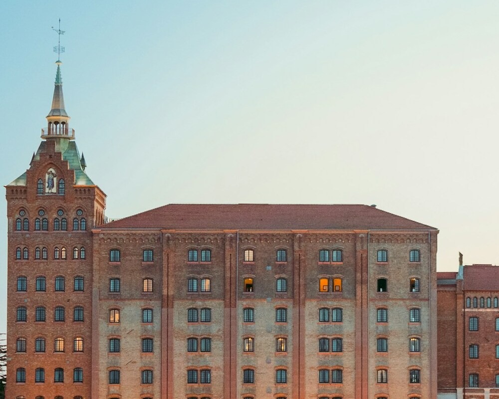 The front side of the Hilton Molino Stucky at sunset.