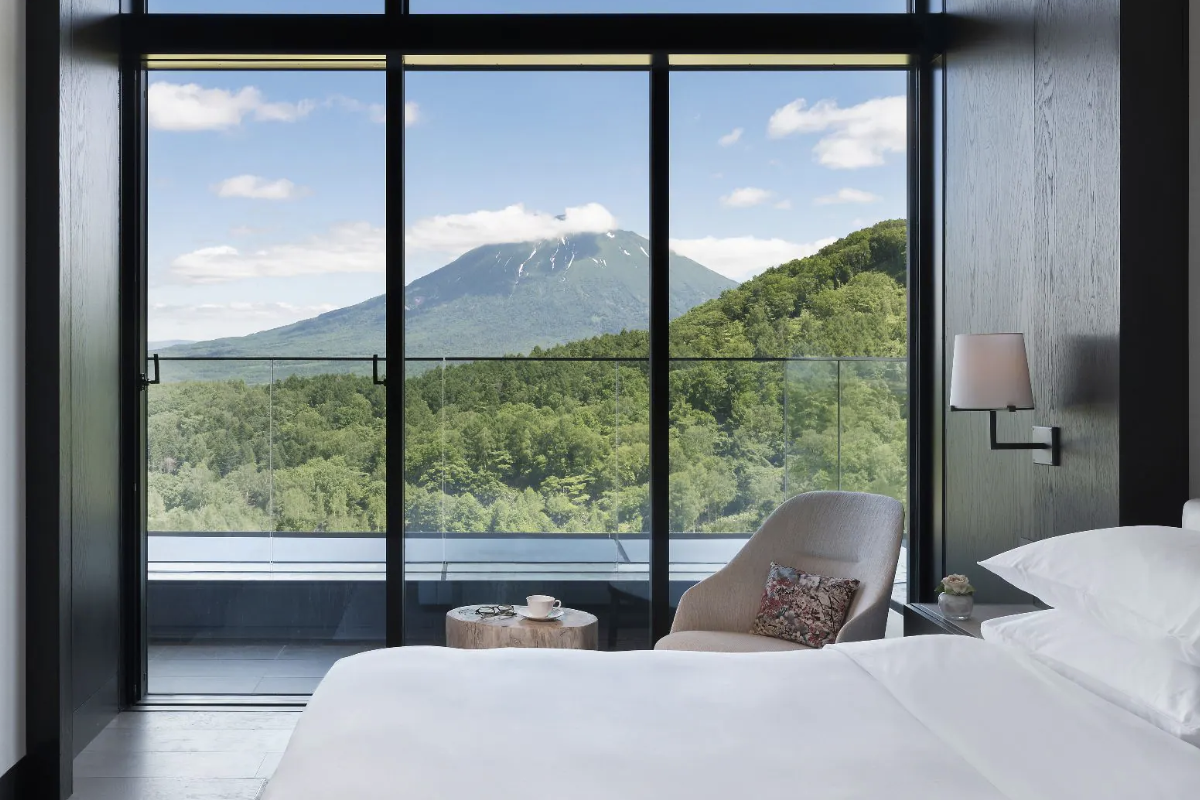 Window and room view of a suite at the Park Hyatt Niseko Hanazono.