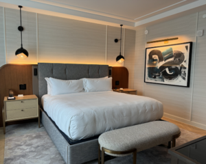 a king-size bed in a fancy hotel room