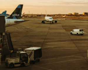 JetBlue planes at the airport at sunset