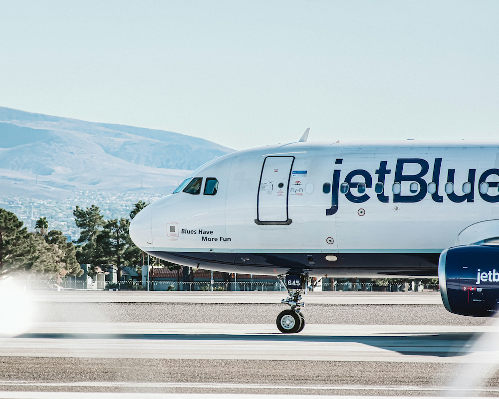 a JetBlue plane on the apron